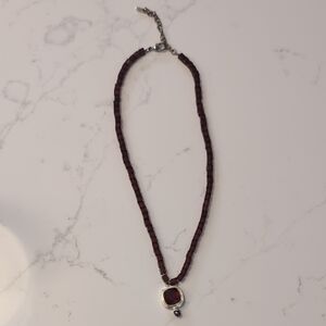 Elegant Brown Beaded Necklace with Silver Pendant